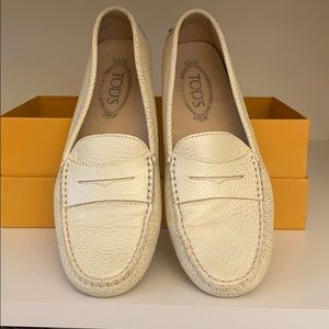 Tods ivory and gold loafers